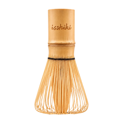 Traditional bamboo whisk with isshiki branded on the handle, shown upright on a white background
