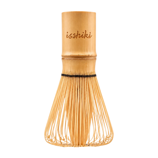 Traditional bamboo whisk with isshiki branded on the handle, shown upright on a white background